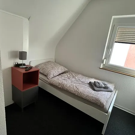 Quarto em Acomodações Particulares Monteurzimmer, Business-room, 1-bett, 2-bett, 3-bett, Kueche, Smart-tv *