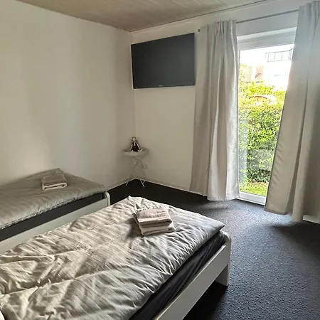 Quarto em Acomodações Particulares Monteurzimmer, Business-room, 1-bett, 2-bett, 3-bett, Kueche, Smart-tv